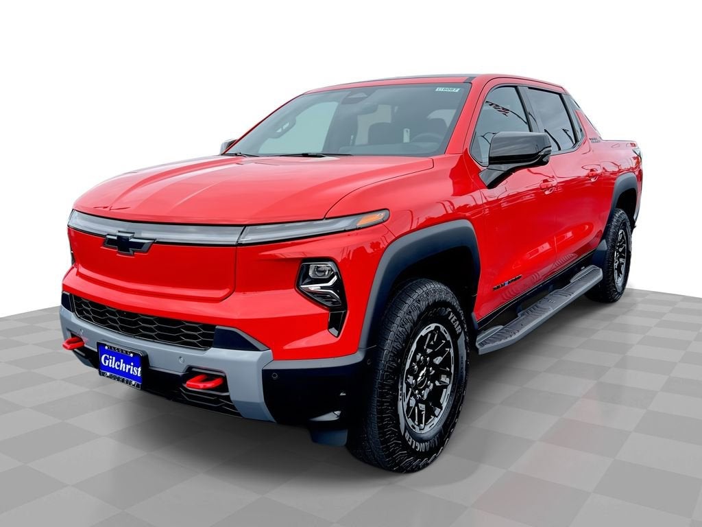 2026 Chevrolet Silverado EV Trail Boss - Extended Range in Habanero Orange — front three-quarter view